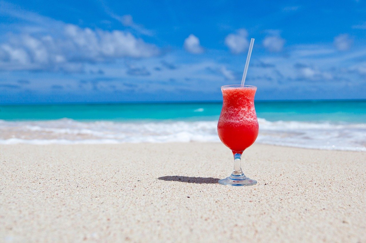 drink, cocktail, beach, beverage, refreshment, alcoholic drink, alcoholic beverage, glass, coast, sand, shore, nature, seashore, paradise, tropical, caribbean sea, caribbean